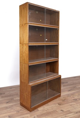 Lot 67 - Simplex: a pair of mid-20th Century teak sectional bookcases
