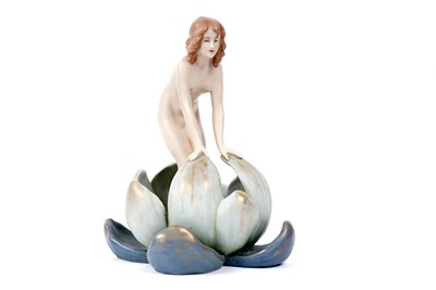 Lot 387 - ﻿A Royal Dux figure of a lady emerging from a water lily
