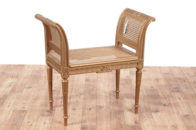 Lot 450 - A French Louis XV style gold painted window seat