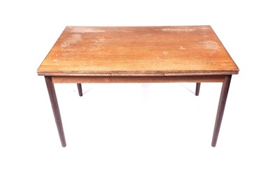 Lot 36 - A mid-20th Century teak extending dining table and six dining chairs