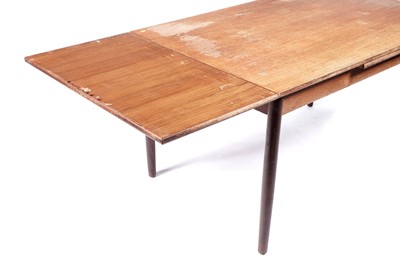 Lot 36 - A mid-20th Century teak extending dining table and six dining chairs