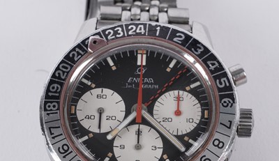 Lot 509 - Enicar Jet Graph GMT: a stainless steel and chromium plated cased manual wind chronograph wristwatch