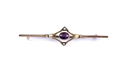 Lot 24 - An amethyst and seed pearl bar brooch; and another