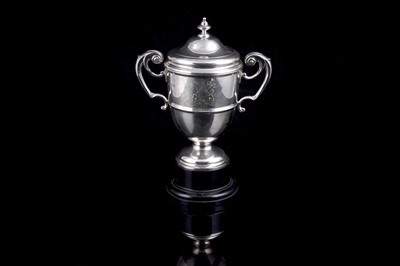Lot 531 - A George VI silver trophy cup and cover, and rosette, for the Royal Tournament 1952