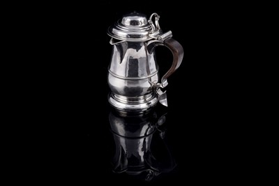 Lot 532 - A George III silver tankard, later converted to a flagon