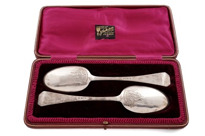 Lot 566 - A pair of George V silver picture-back tablespoons