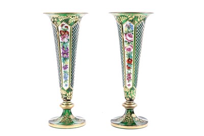 Lot 1167 - ﻿A pair of 19th Century Bohemian green glass trumpet vases﻿