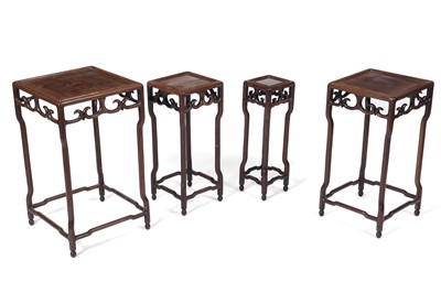 Lot 1287 - A nest of four Chinese padauk wood tables
