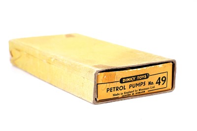 Lot 70 - A Dinky Toys No. 49 Petrol Pumps and Oil Bin set