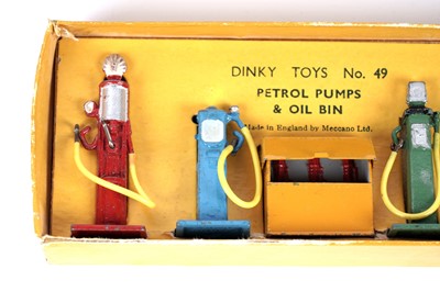 Lot 70 - A Dinky Toys No. 49 Petrol Pumps and Oil Bin set