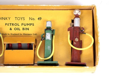 Lot 70 - A Dinky Toys No. 49 Petrol Pumps and Oil Bin set