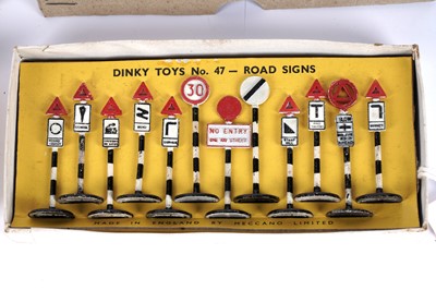 Lot 71 - A Dinky Toys No. 47 Road Signs set; and a No. 49 Petrol Pump set