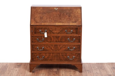 Lot 471 - Bevan Funnell: a ‘Reprodux’ burr walnut and walnut banded bureau