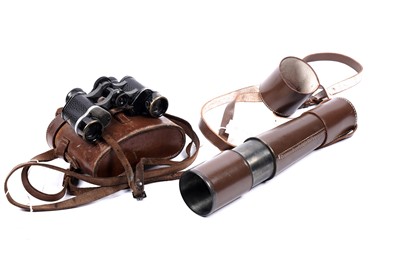 Lot 105 - A four drawer leather bound telescope; and a pair of binoculars