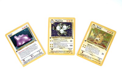 Lot 327 - Three first edition shiny Fossil set Pokémon cards