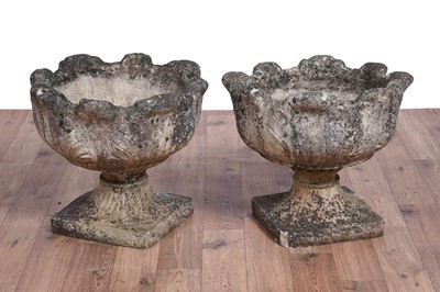 Lot 437 - A pair of composite garden urns