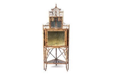 Lot 1271 - A Victorian Aesthetic Movement bamboo corner cabinet