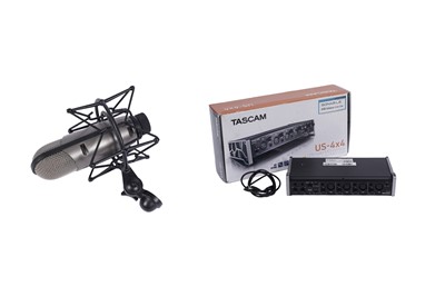 Lot 603 - A boxed Tascam US-4x4 USB Audio/MIDI interface; and a CAD M179 microphone