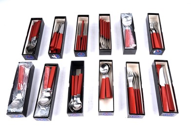 Lot 429 - ﻿A set of David Mellor stainless steel cutlery﻿ with burnt orange acetal handles
