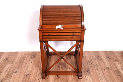 Lot 515 - Granville: a mahogany roll top cabinet