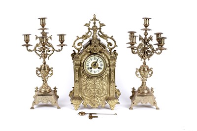 Lot 607 - Japy Frères & Cie: a 19th Century brass 8-day mantel clock; and candelabra garnitures