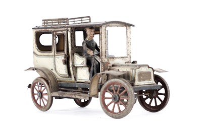 Lot 11 - An early 20th Century lithographed tin toy limousine