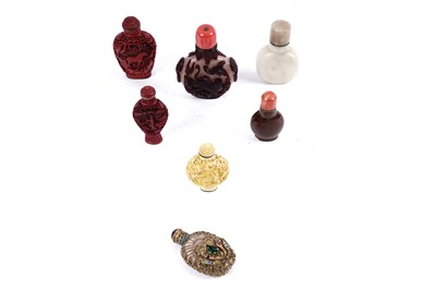 Lot 275 - A selection of East Asian snuff bottles; and an Eastern glass bottle