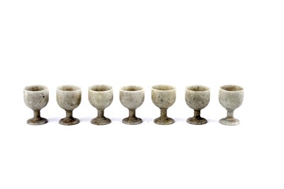 Lot 292 - ﻿A set of seven Japanese hardstone miniature goblets