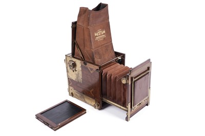 Lot 133 - An Adams Tropical Minex de Luxe half-plate reflex camera