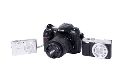 Lot 160 - Two digitals cameras; and other accessories