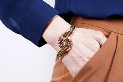 Lot 727 - An 18ct yellow gold, ruby and diamond bracelet