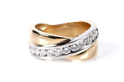 Lot 739 - An eleven stone diamond half-hoop eternity ring
