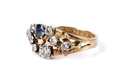 Lot 742 - A modern sapphire and diamond dress ring