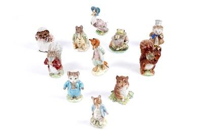 Lot 374 - A collection of Beswick Beatrix Potter ceramic figures