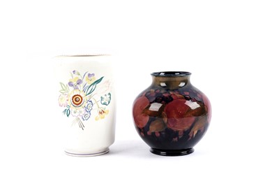 Lot 294 - A Moorcroft vase; and a Poole Pottery vase