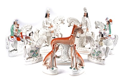 Lot 322 - A collection of Staffordshire figures