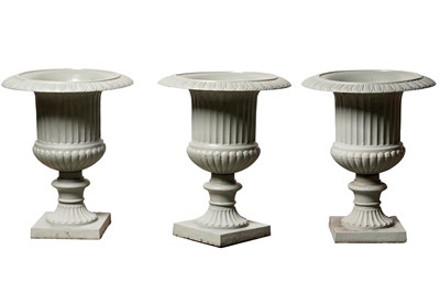 Lot 947 - Three substantial Victorian style cast iron garden urns