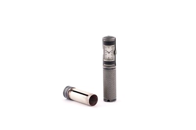 Lot 585 - Manor of Cartier: a silver and black enamel cased combination lipstick watch