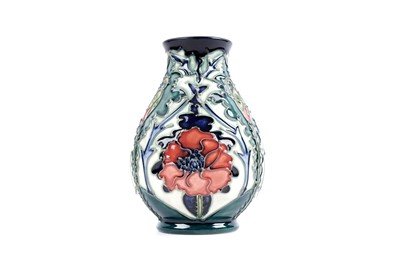 Lot 300 - ﻿A Moorcroft bulb vase with poppy decoration