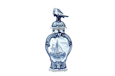 Lot 1156 - An 18th Century Dutch Delft vase and cover