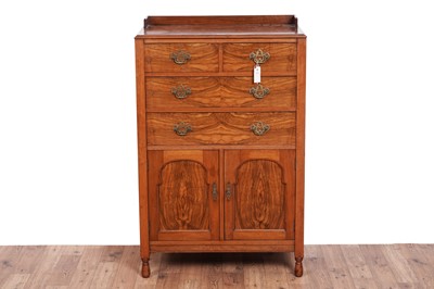 Lot 509 - Denby & Spinks Ltd, Leeds: a burr walnut and walnut cabinet, c.1920