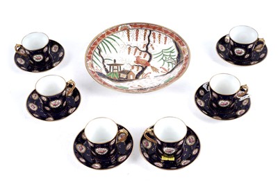 Lot 334 - ﻿A set of Royal Crown Derby cups and saucers; and a decorative plate