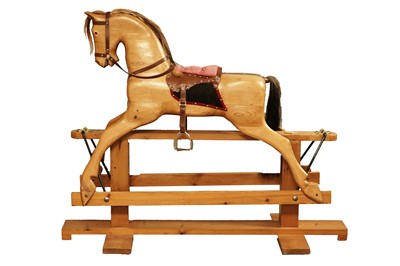 Lot 359 - A 20th Century carved pine rocking horse