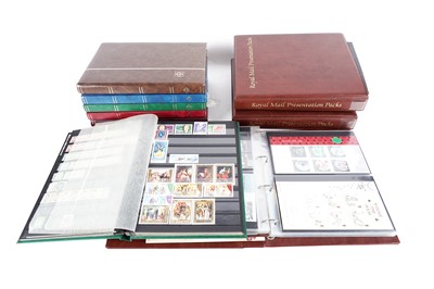 Lot 180 - Three albums of presentation pack stamps; and other world stamps