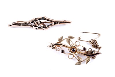 Lot 36 - An early 20th Century amethyst and seed pearl brooch; and another