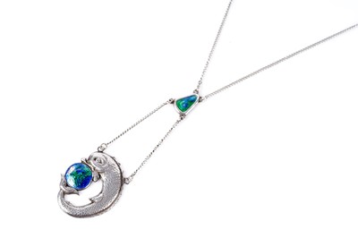Lot 760 - A Charles Horner Edwardian Arts and Crafts silver dolphin pendant