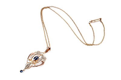 Lot 197 - An Edwardian style gold drop pendant