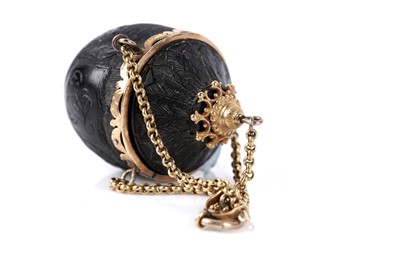 Lot 768 - A 19th Century carved jet and gold chatelaine love token