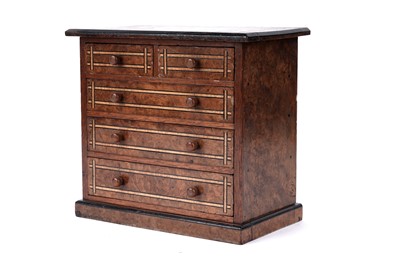 Lot 1243 - A 19th Century walnut parquetry apprentice miniature chest of drawers