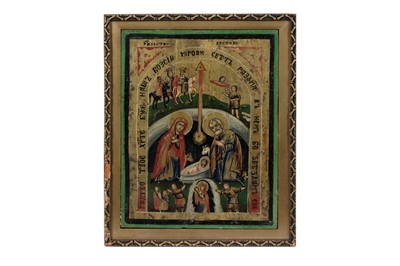 Lot 988 - 19th Century Balkan School - A religious icon depicting scenes from the Nativity